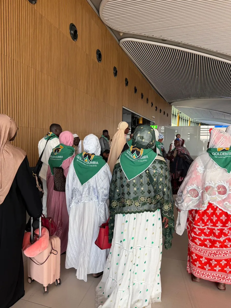 Golden Umrah group travelling together at the airport